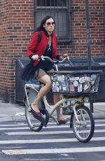 FAMKE JANSSEN Out Riding a Bike in New York 10/20/2021