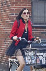 FAMKE JANSSEN Out Riding a Bike in New York 10/20/2021