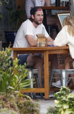 GABRIELLA BROOKS and Liam Hemsworth Out for Lunch at Bayleaf Cafe 10/13/2021