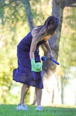 JAMI  CHUNG Cleaning up After Her Dog at a Park in Los Angeles 10/29/2021