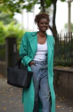 JUSTINE SKYE Out Carrying DKNY Effortless Bag in New York 10/12/2021
