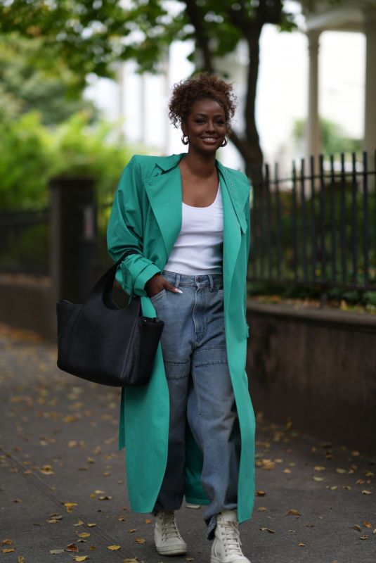 JUSTINE SKYE Out Carrying DKNY Effortless Bag in New York 10/12/2021