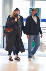 KIRSTEN DUNST and Her Agent Stephen Huvane at JFK Airport in New York 10/07/2021