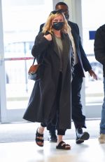 KIRSTEN DUNST and Her Agent Stephen Huvane at JFK Airport in New York 10/07/2021