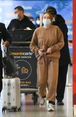 LINDSAY LOHAN and Bader Shammas at JFK Airport in New York 10/29/2021