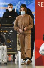 LINDSAY LOHAN and Bader Shammas at JFK Airport in New York 10/29/2021