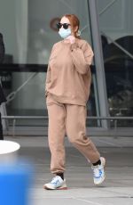 LINDSAY LOHAN and Bader Shammas at JFK Airport in New York 10/29/2021