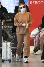 LINDSAY LOHAN and Bader Shammas at JFK Airport in New York 10/29/2021