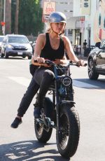 MALIN AKERMAN Out Riding Her Electric Bike in Los Angeles 10/01/2021