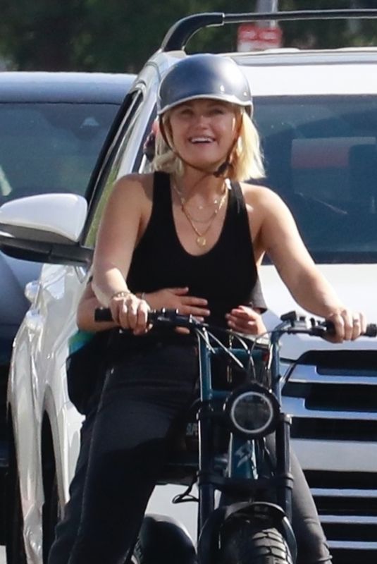 MALIN AKERMAN Out Riding Her Electric Bike in Los Angeles 10/01/2021