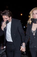 NICOLA PELTZ and Brooklyn Beckham Leaves Ritz Hotel at Paris Fashion Week 10/02/2021