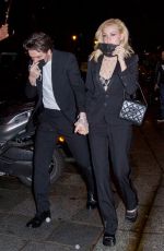 NICOLA PELTZ and Brooklyn Beckham Leaves Ritz Hotel at Paris Fashion Week 10/02/2021