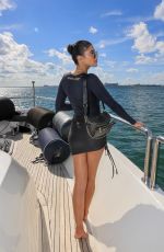 OLIVIA CULPO, CAMILA COELHO, SHANINA SHAIK, LORI HARVVEY and FRIDA AASEN in James Bond–themed Michael Kors Swimsuits at a Yacht in Miami 10/27/2021