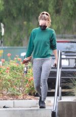 OLIVIA WILDE in a Green Sweater Top and Grey Leggings Out for Coffee in Los Feliz 10/22/2021