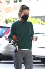 OLIVIA WILDE in a Green Sweater Top and Grey Leggings Out for Coffee in Los Feliz 10/22/2021
