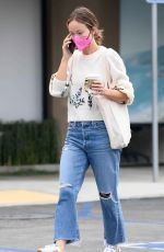 OLIVIA WILDE in Ripped Denim at Starbucks in Los Angeles 10/07/2021