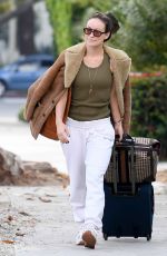 OLIVIA WILDE Out with Luggage in Los Angeles 10/25/2021