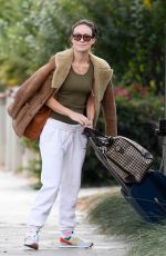 OLIVIA WILDE Out with Luggage in Los Angeles 10/25/2021