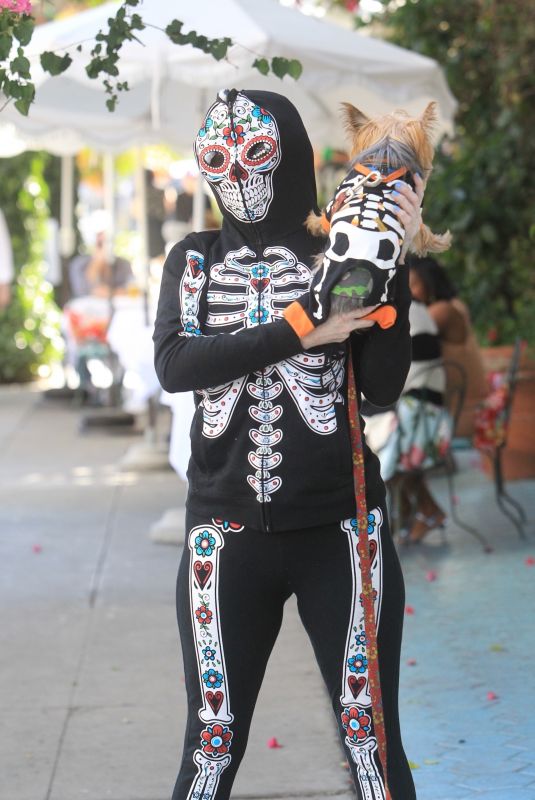 PHOEBE PRICE in a Skeleton Costume Out in Hollywood 10/28/2021