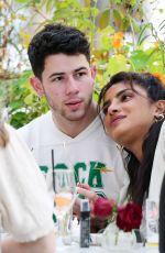 PRIYANKA CHOPRA and Nick Jonas at Beach Blanket Babylon Restaurant in London 08/13/2021