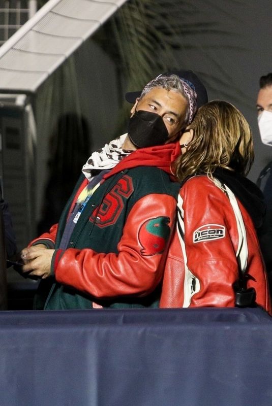 RITA ORA and Taika Waititi Arrives at The Rolling Stones Concert in Los Angeles 10/14/2021