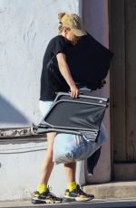 SUKI WATERHOUSE Cleans Out Her Car Out in Los Angeles 10/03/2021