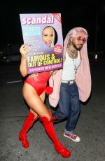 TANA MOGEAU Dressed as a Scandalous Tabloid Arrives at a Halloween Party in Los Angeles 10/27/2021