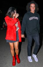VANESSA HUDGENS and Cole Tucker Arrives at The Rolling Stones Concert in Los Angeles 10/14/2021