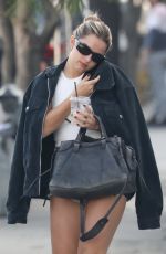 ADDISON RAE in Daisy Dukes at Joan