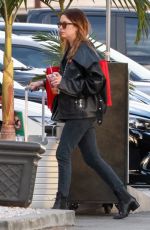 ASHLEY BENSON Arrives at Airport in Burbank 11/23/2021