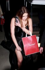 ASHLEY BENSON Leaves Paris Hilton