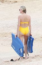 CHARLIZE THERON in a Yellow Swimsuit in Cabo San Lucas 11/26/2021