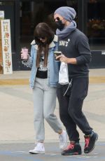 DAKOTA JOHNSON and Chris Martin at SunLife Organics in Malibu 10/31/2021