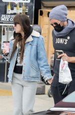DAKOTA JOHNSON and Chris Martin at SunLife Organics in Malibu 10/31/2021