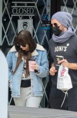 DAKOTA JOHNSON and Chris Martin at SunLife Organics in Malibu 10/31/2021