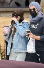 DAKOTA JOHNSON and Chris Martin at SunLife Organics in Malibu 10/31/2021