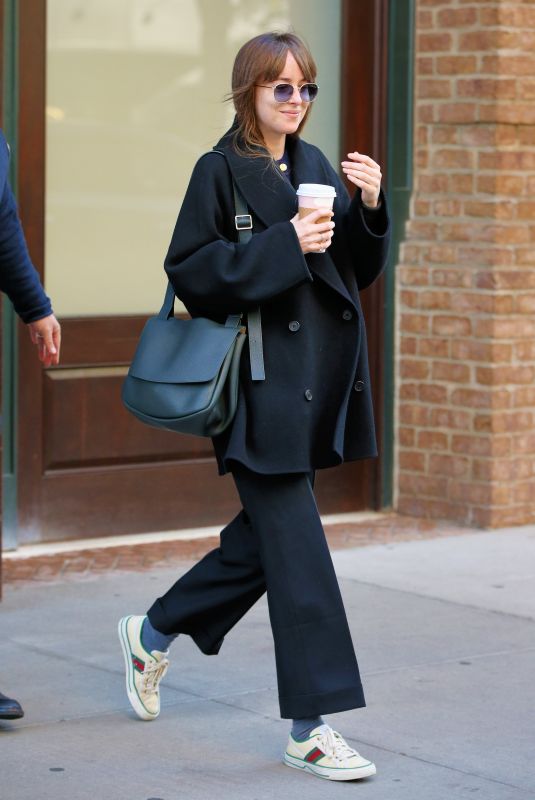 DAKOTA JOHNSON Leaves Her Hotel in New York 11/29/2021