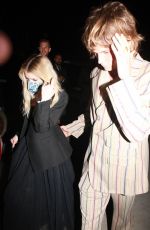EMMA ROBERTS Arrives at Paris Hilton