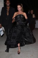 KATE BECKINSALE Leaves Paris Hilton