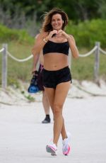 KELLY BENSIMON Out Jogging on the Beach in Miami 11/18/2021