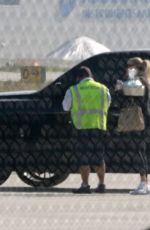 KHLOE KARDASHIAN Arrives at Van Nuys Airport 11/20/2021