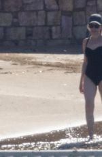 KYLIE MINOGUE in Swimsuit at a Beach in Athens 11/04/2021