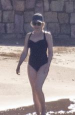 KYLIE MINOGUE in Swimsuit at a Beach in Athens 11/04/2021