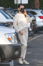 MILA KUNIS Takes a Phone Call Out in Santa Monica 11/09/2021