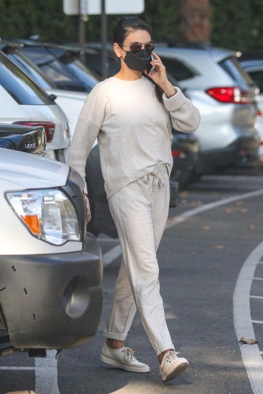 MILA KUNIS Takes a Phone Call Out in Santa Monica 11/09/2021