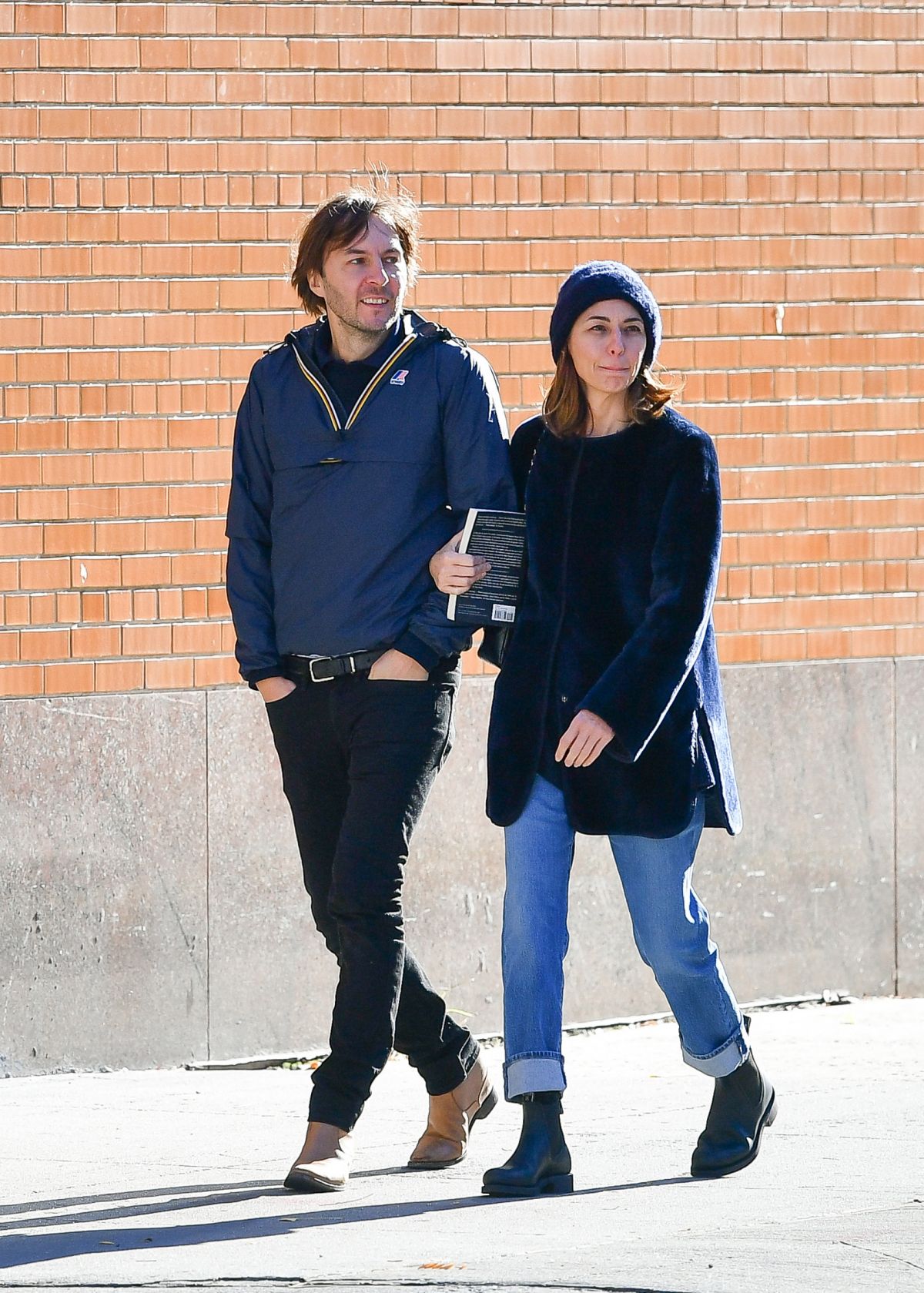 Sofia Coppola and Thomas Mars both cut very casual figures while walking  their dog in New York City