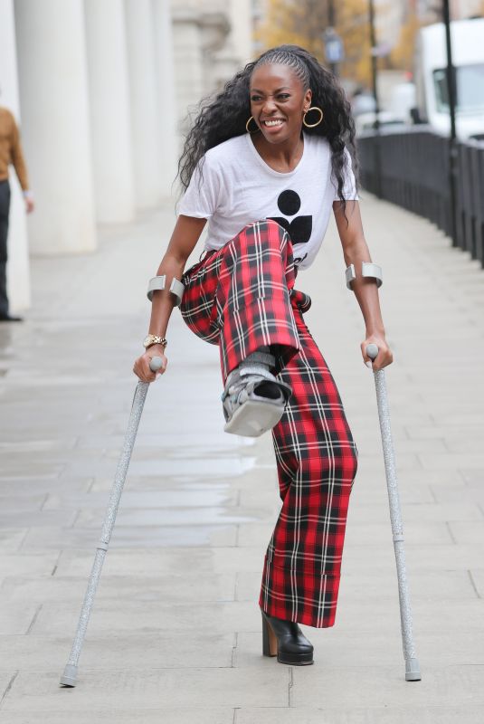 AJ ODUDU Leaves Morning Live TV on Crutches in London 12/20/2021