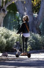 ALESSANDRA AMBROSIO Out Riding a Scooter in Santa Monica 12/19/2021