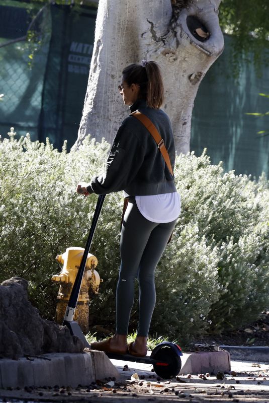 ALESSANDRA AMBROSIO Out Riding a Scooter in Santa Monica 12/19/2021
