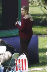 ASHLEE SIMPSON Takes Her Daughter at a Party in Los Angeles 12/05/2021